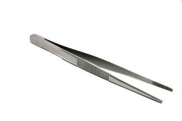 a Medical image of metallic tweezers close-up
