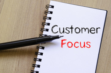 Customer focus write on notebook