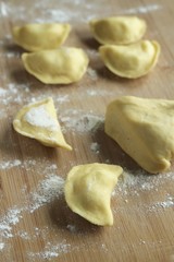preparing dumplings / raw dumplings - polish pierogi
