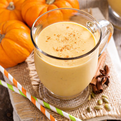 Healthy pumpkin smoothie in big mugs