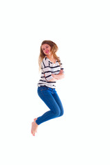 smiling  girl in white blank t-shirt jumping