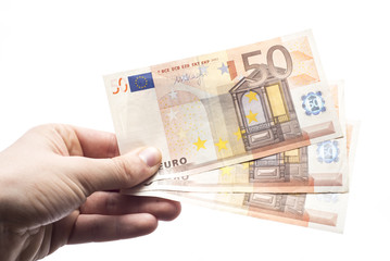 Ręka trzymająca Euro wyizolowana na białym tle