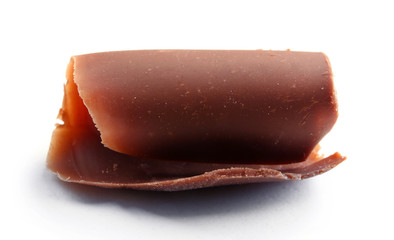 Chocolate curl isolated on white