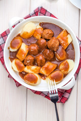 Potato dumplings with meat meatballs.