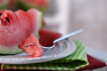 Sliced watermelon on plate closeup