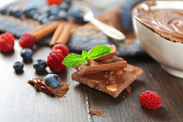 Beautiful composition with chocolate cream and ripe berries