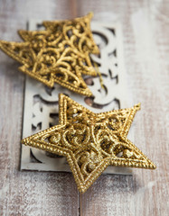 Fototapeta na wymiar Golden Glitter Star and Tree Christmas Ornaments