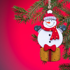 Toy snowman Christmas decoration. Vintage style, white backgroun