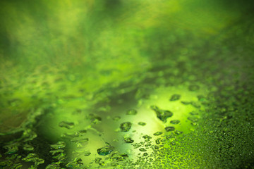 Drops of water on a color background. Shallow depth of field. Se