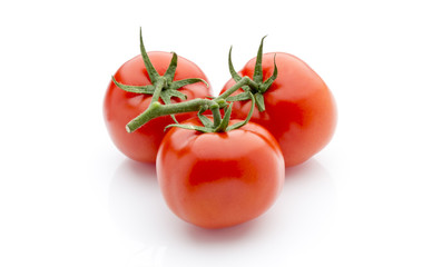 Tomato on the white isolatd background.