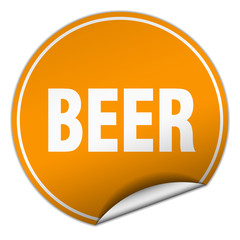 beer round orange sticker isolated on white