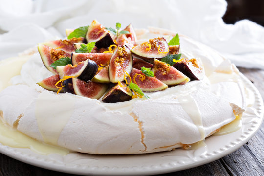 Pavlova cake with fresh figs and orange zest - Powered by Adobe