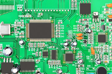 Printed computer motherboard with microcircuit, close up