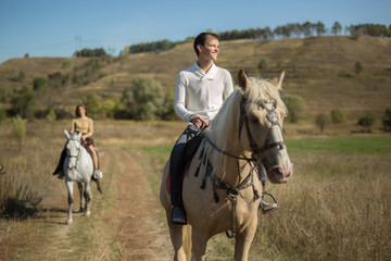 Fototapeta premium Young couple riding