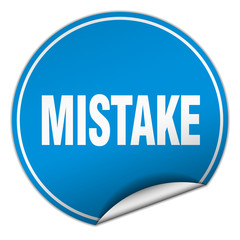 mistake round blue sticker isolated on white