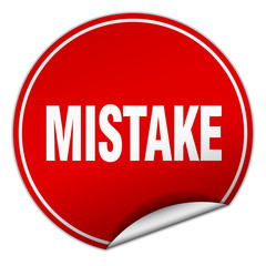 mistake round red sticker isolated on white