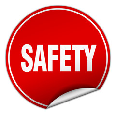 safety round red sticker isolated on white