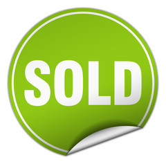 sold round green sticker isolated on white
