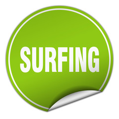 surfing round green sticker isolated on white