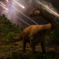 Extinction Of The Dinosaurs - An apatosaurus looks upon meteors raining down that would precede the larger asteroid strike that would lead to the extinction of the dinosaurs 65 million years ago. © auntspray