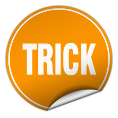 trick round orange sticker isolated on white