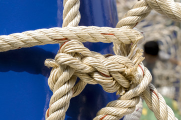 Rope And Knot On Background. Outdoor view, Selective focus and Close up detail image