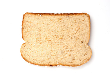 overhead view of a slice of whole grain oatnut bread isolated on