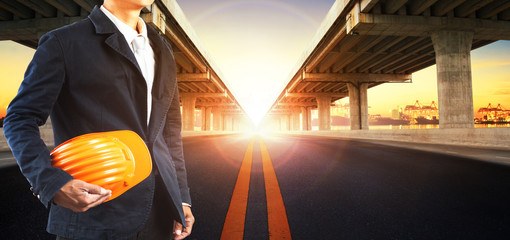 sun rising behind perspective on bridge ram construction and asp