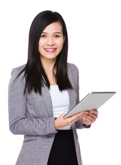Asian Young Businesswoman use of the tablet pc