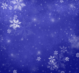 white falling snow on deep blue background, Merry Christmas or winter background design with falling snowflakes in blue sky