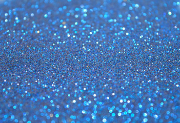 Blurry background of blue glitter sparkle 