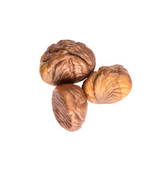 Roasted whole peeled chestnut over white background