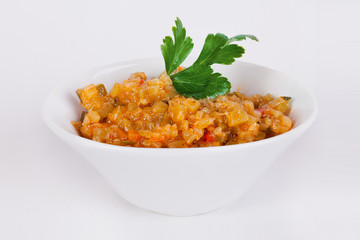squash caviar with parsley in Moscow on a white background