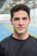Fit man on the running track