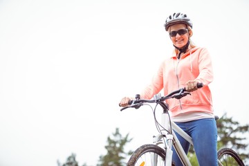 Happy woman on a bike ride
