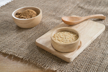  Ingredient grain, wheat germ and  Brown sugar  in wooden bowl