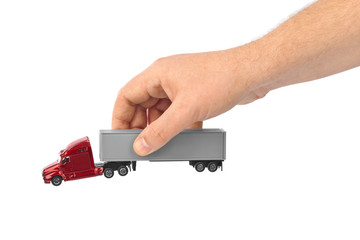 Toy car truck in hand