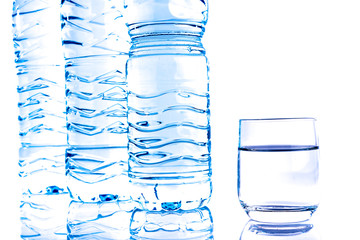 Plastic water bottles with a glass