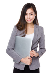 Asian Young Businesswoman hold with laptop computer