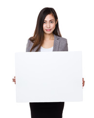 Naklejka premium Businesswoman show with white banner