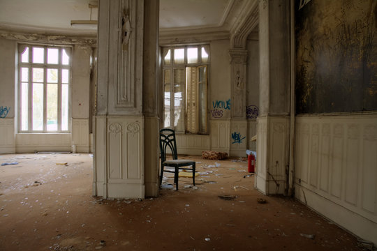 abandoned chair in hotel lobby