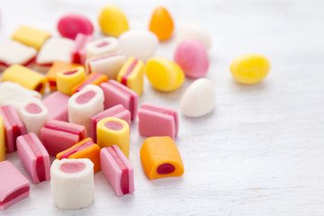 Fototapeta na wymiar Delicious sweet candy with copy space