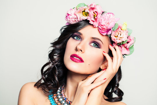 Beautiful Woman Relaxing and Dreaming. Flowers Wreath and Makeup