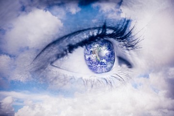 Composite image of close up of female blue eye