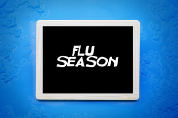 blackboard with words 'flu season'