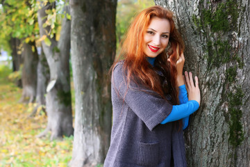 Girl autumn leaves coat