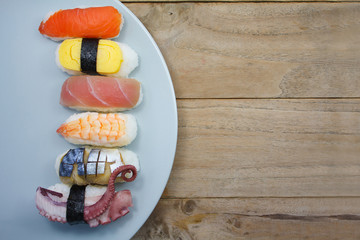 Maki Sushi set on wooden background