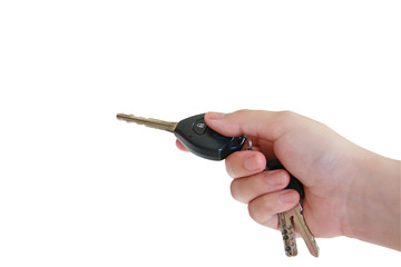 women's hand presses on the remote control car alarm systems