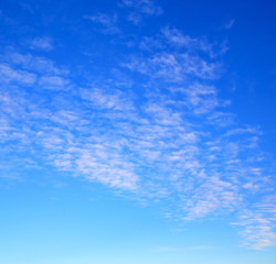 in the blue sky white soft clouds and abstract background