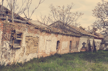 Fototapeta premium Village abandoned with some old houses in ruins. Aspect vintage, like instagram.